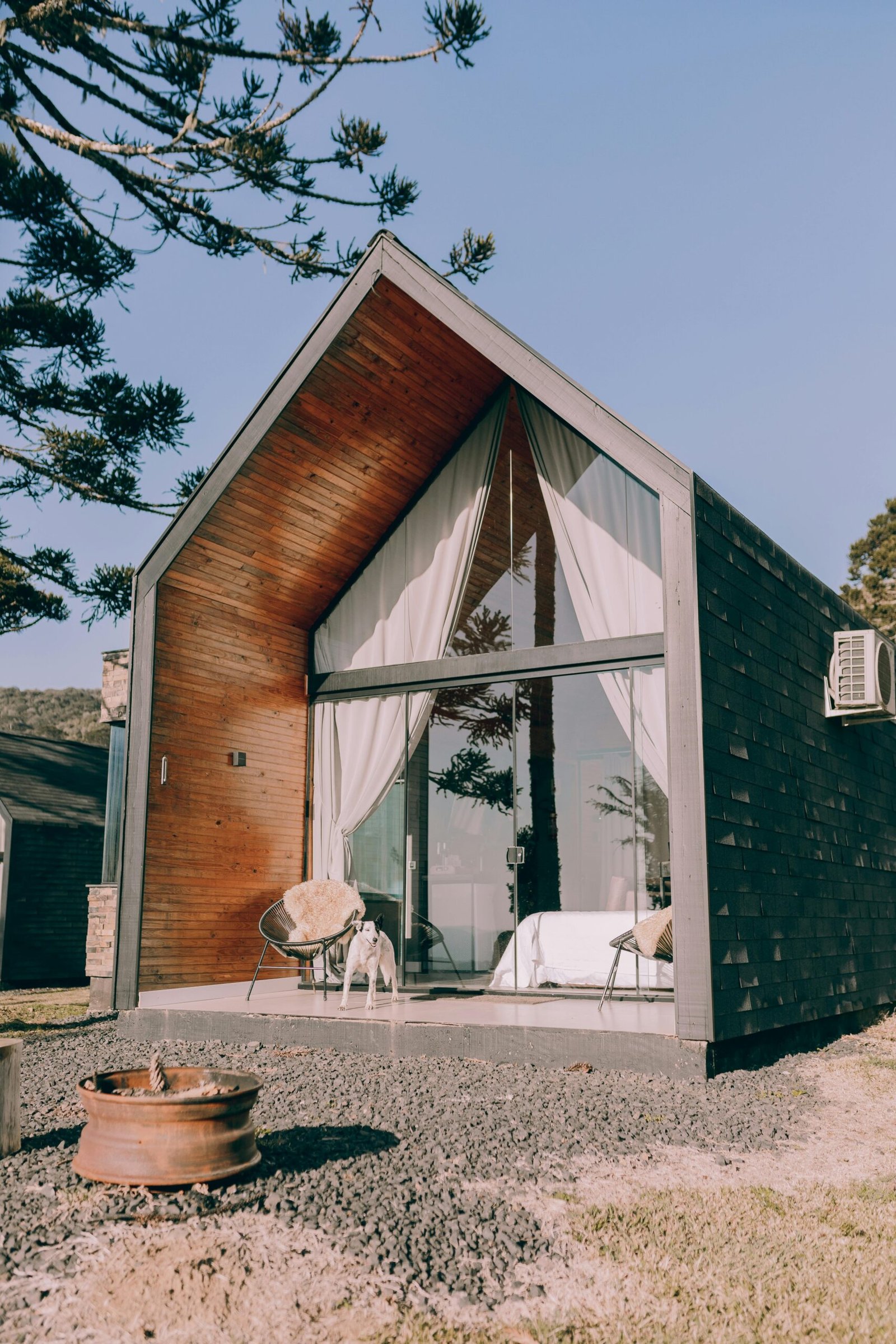 A small cabin with a wood burning stove